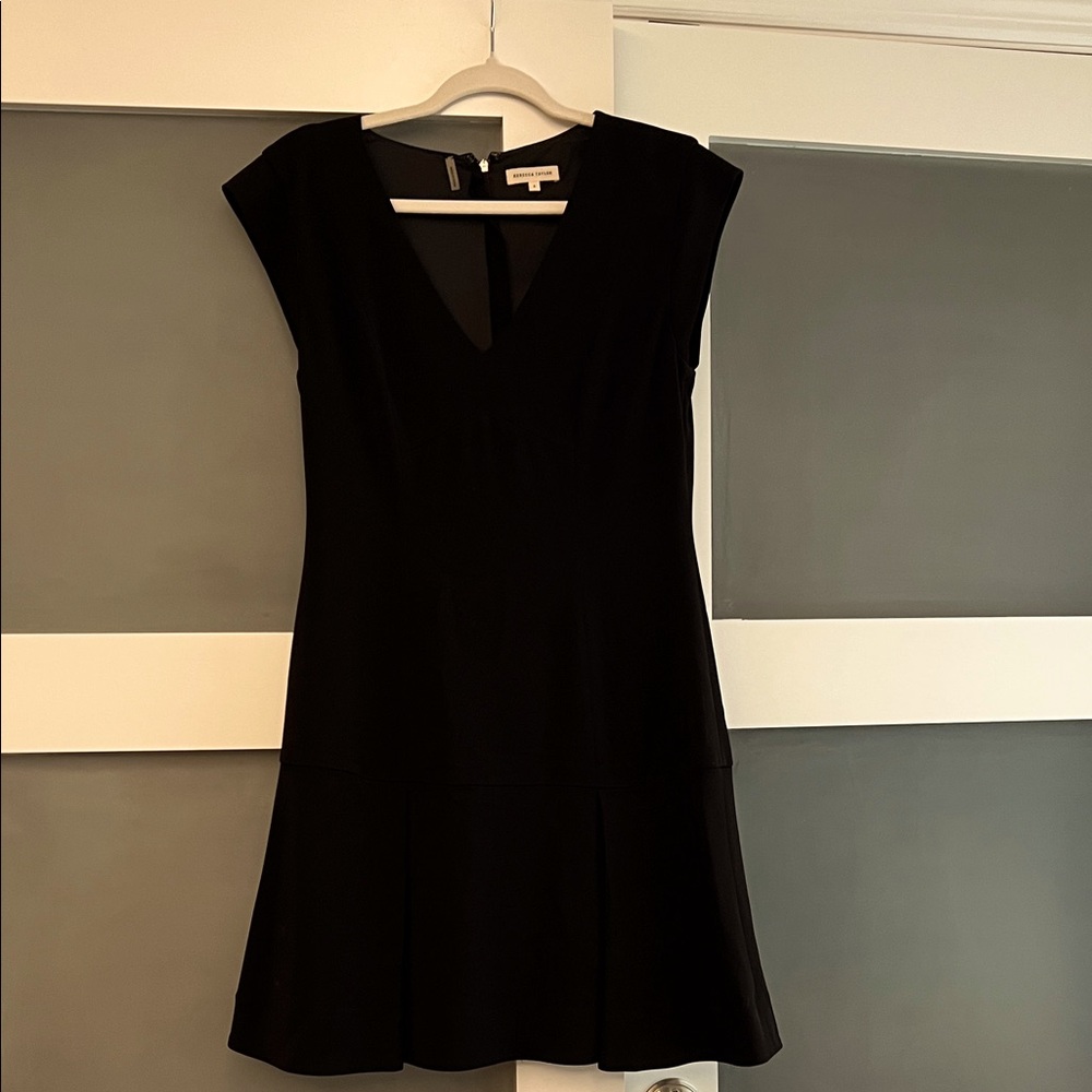 Rebecca Taylor Black V Neck dress Pleated skirt. Fitted waist.Cap sleeves Size 6